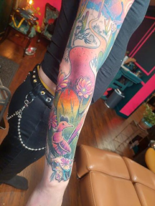 forearm colored in the tattoo sleeve